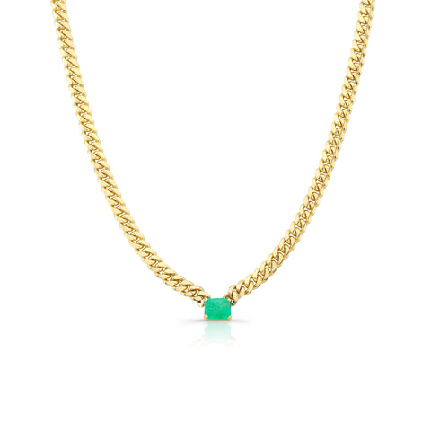 solid gold cuban chain with columbian emerald 