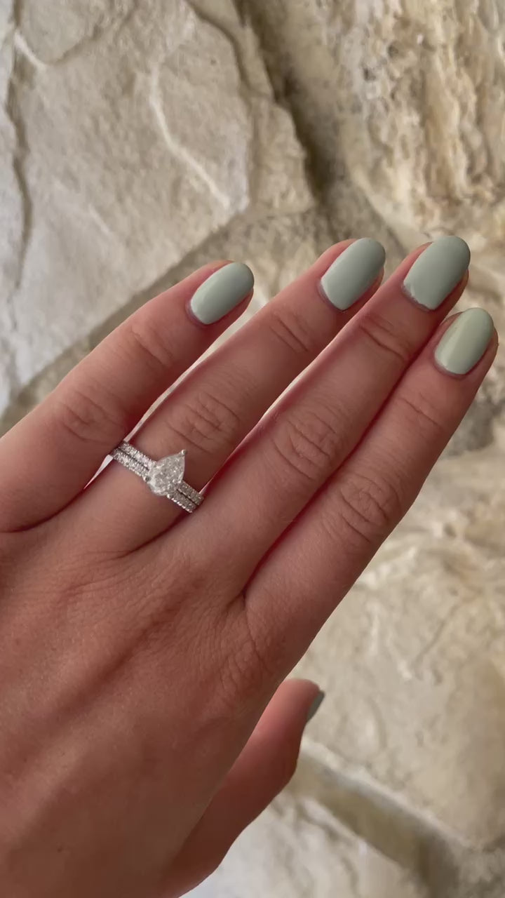 video of pear diamond solitaire engagement ring