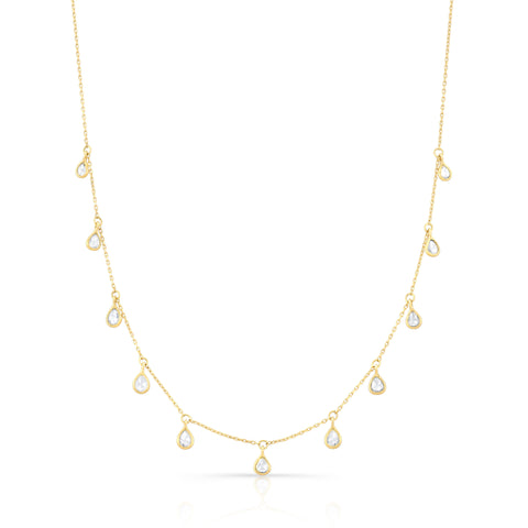 gold necklace with teardrop shaped diamonds