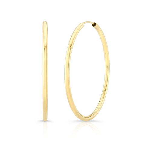 14ky gold weightless hoop earrings. Shop now with Carter Eve Jewelry.