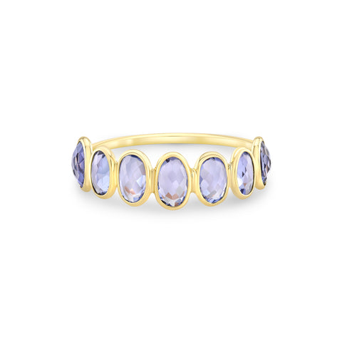 gold ring with seven tanzanite gemstones