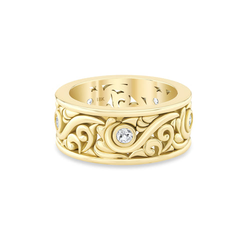 Men's 18k yellow gold scroll ring with intricate designs and bezel set white topaz. Luxury men's wedding band. 