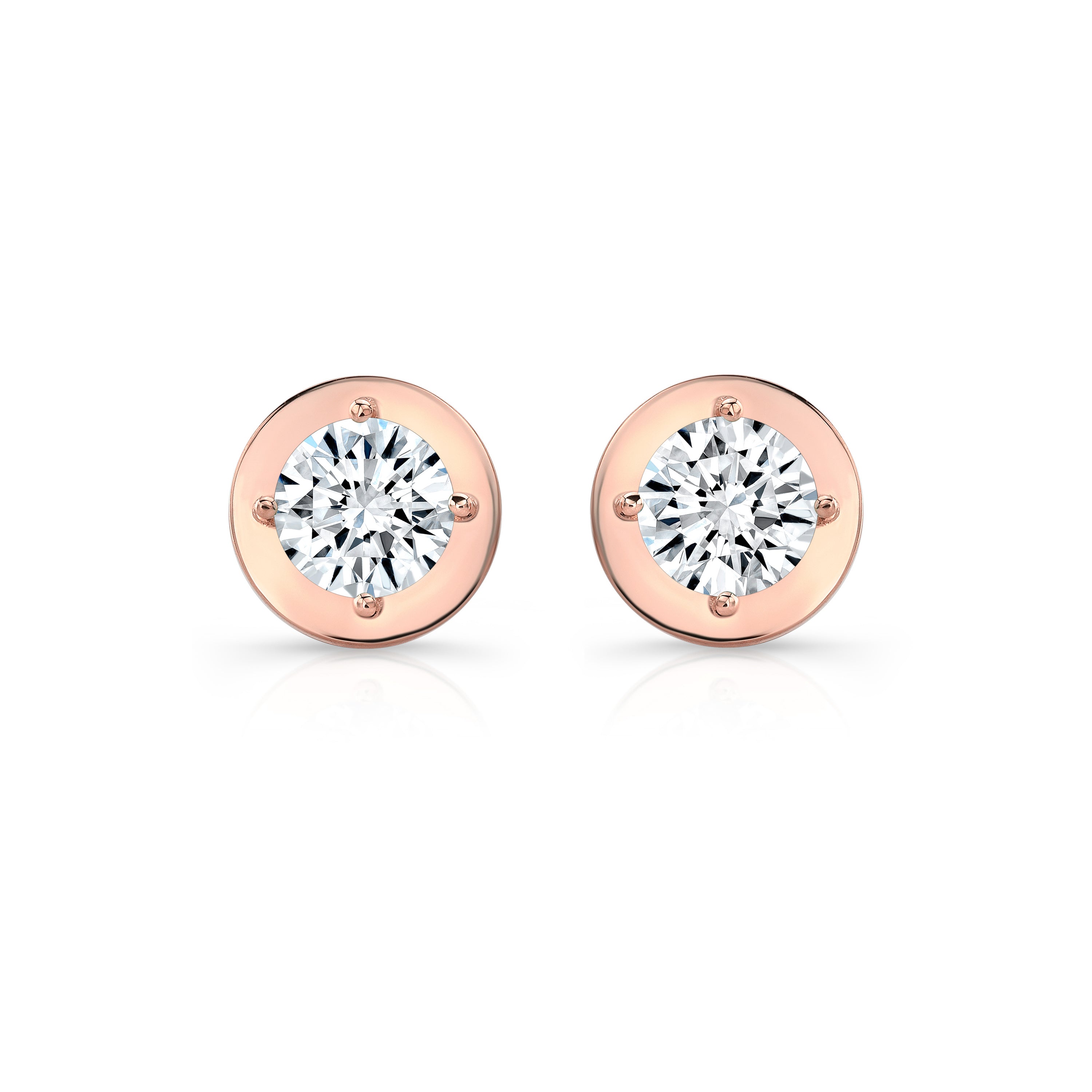 Rose gold stud earrings with clear gemstones on a white background
