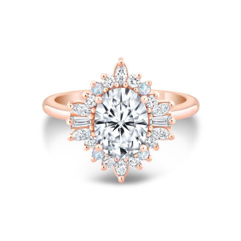 Vintage Inspired Engagement Ring with Moissanite, Diamonds and Rainbow Moonstones in 14k rose gold. Shop now at carterevejewelry.com