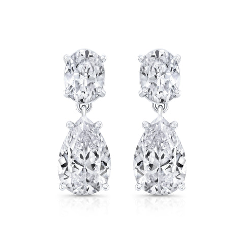 Oval Diamond + Pear Diamond Drop Earrings. Wedding Day Earrings designed by Carter Eve Jewelry. Shop now for a touch of luxury.