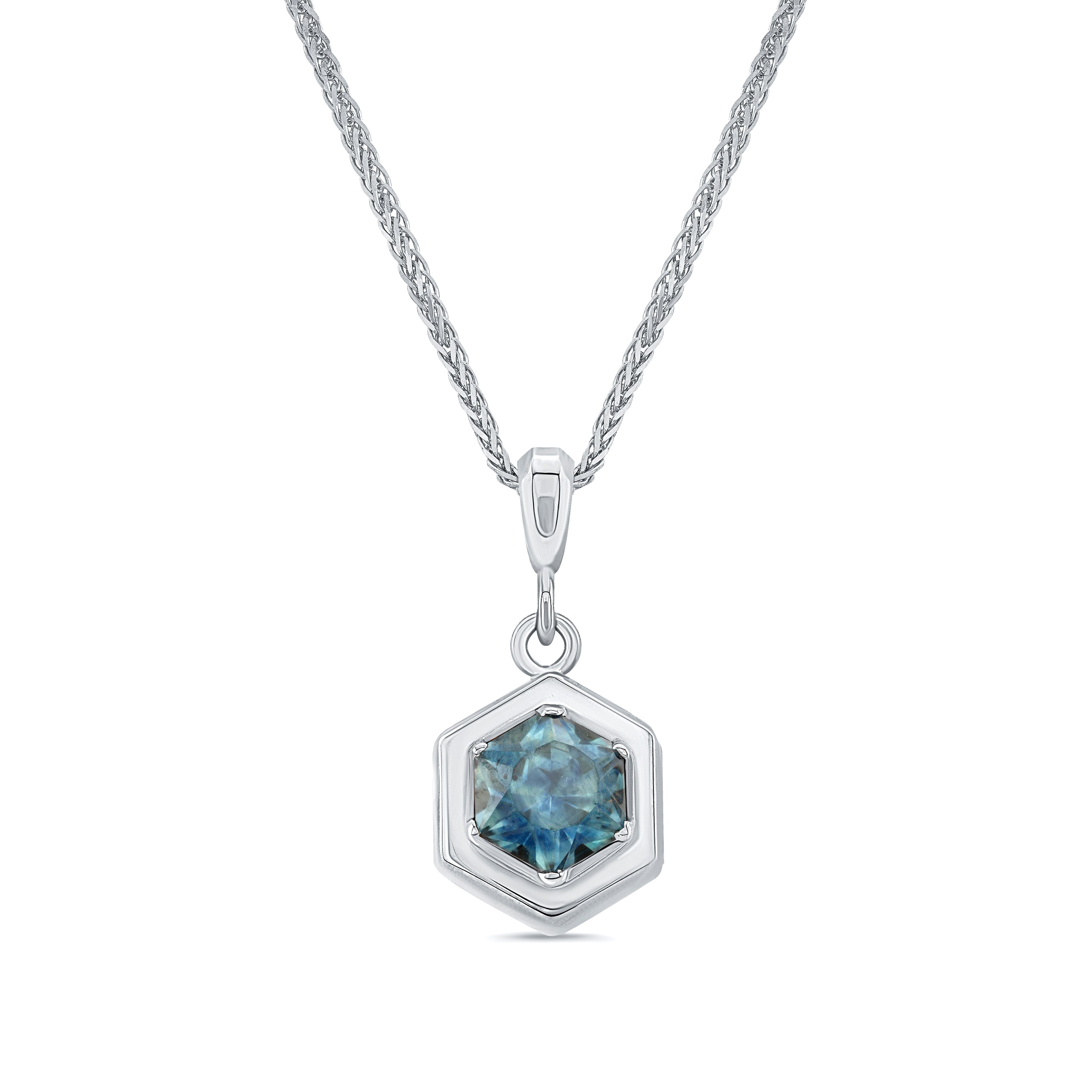 14k white gold pendant with hexagon cut montana sapphire on a white background