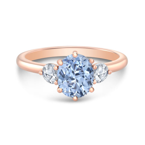 14k rose gold blue sapphire and diamond engagement ring. Three stone engagement ring. Unique engagement ring. Shop now for a touch of luxury. 