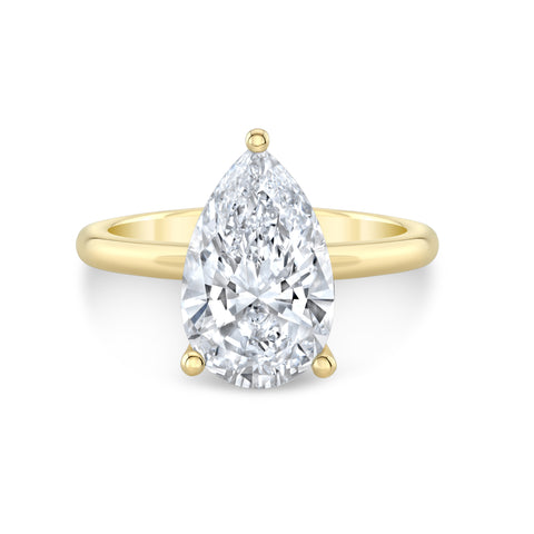 pear diamond solitaire ring in solid yellow gold
